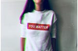 Woman wearing t-shirt ‘you matter’. Photo by Eneida Hoti on Unsplash