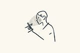 An illustration of a person being enchanted by their phone.