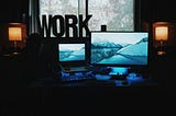 A minimalist workspace setup featuring namy devices and coffee to represent a productive morning routine.