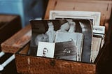 a box of old black and white photographs
