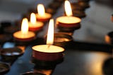 five lit candles