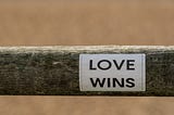 Why Do I Write “Keep the Faith, Love Wins” at the End of Each of My Articles?