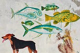 mural of a doberman standing beneath various fish.