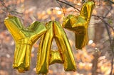 Big balloons that spell out YAY