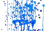 blue ink dripping down a white background