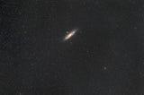 An image of a galaxy alone in the outer space.