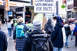 people marching for facts