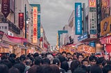 Lots of people in a shopping street in Japan