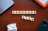 Scrabble tiles spelling Language tips