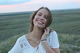 A happy, positive woman smiles
