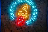 Sign board of a rocket and text alerting about a problem