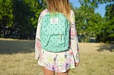 A child wearing a backpack.
