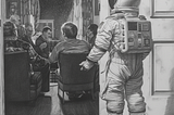 Image of a boy in a spacesuit, looking into a room filled with his relatives. Created by author on Midjourney.