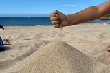 Beach Physics for Economists: Sand piles!