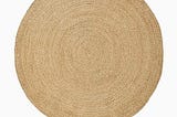 chunky-braided-jute-round-rug-6-round-natural-west-elm-1