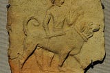Paws in Time: Dogs and Cats in the archaeological record