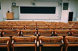 Brown and Black Wooden Chairs Inside Room