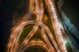 A highway with multiple cars, to represent kafka topics with messages in
