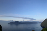 the sea at three in the morning on the summer solstice, with a blue sky
