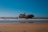 A shipwreck off a beach