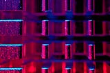 7 Designs for a Universal Quantum Computer