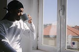 A man drinks coffee alone and stares out his window. It’s about as fun as you’d think.