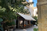 Image shows a cafe/bar in an old street in Nicosia, Cyprus