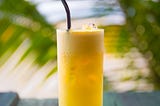 Orange drink containing turmeric