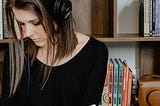 Young woman with headphones on