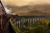 A train understood to be the Hogwarts Express chugs along its famed route toward the legendary school for witches and wizards.