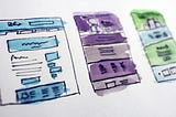 Hand-drawn mockups of various UI designs.