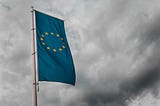 European Union flag hanging from a pole