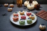 An image of a plate filled with Halloween treats