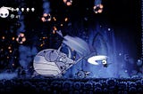 The False Knight boss fight from Hollow Knight. The False Knight is a large armored bug, swinging a hammer at the player. Glowing rocks fall from above.