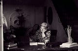 Women writing.