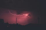 A red sky with lightning