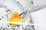 A rubber duck inside a dishwasher