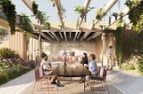 A rendering shows people gathered at a table in an inviting outdoor space with lots of greenery.