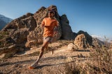 A runner on a mountain trail.