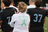‘She found sparkle and joy in everything’: Nashoba Tech honors late music teacher during football…