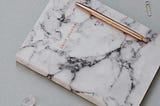 Notebook for journaling with marble texture ✦ Snag more FREE stock photos each month 👉 https://contentpixie.com/secret-snaps/