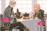 A picture of Harij and Rose eating together at a table next to windows that let sunshine in