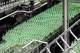 Bottles moving through an actual factory.