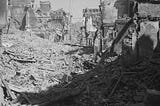 Burned-out and ruined buildings in the Katra Jaimal Singh area of Amritsar after communal violence in the city during the Partition of British India, Punjab, March 1947.