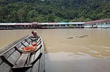 Indigenous communities threatened with legal action by timber giant as flooding devastates Sarawak