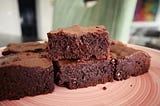 fudge brownies on pink plate