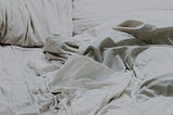 Photo of an unmade bed