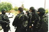 Take Those Masks Off (Not You, Protesters — You, Cops)