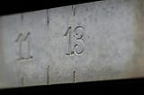 A stone with the number 13 engraved on it.