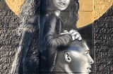 Street art tribute mural of Gianna Bryant riding on Kobe Bryant’s shoulders